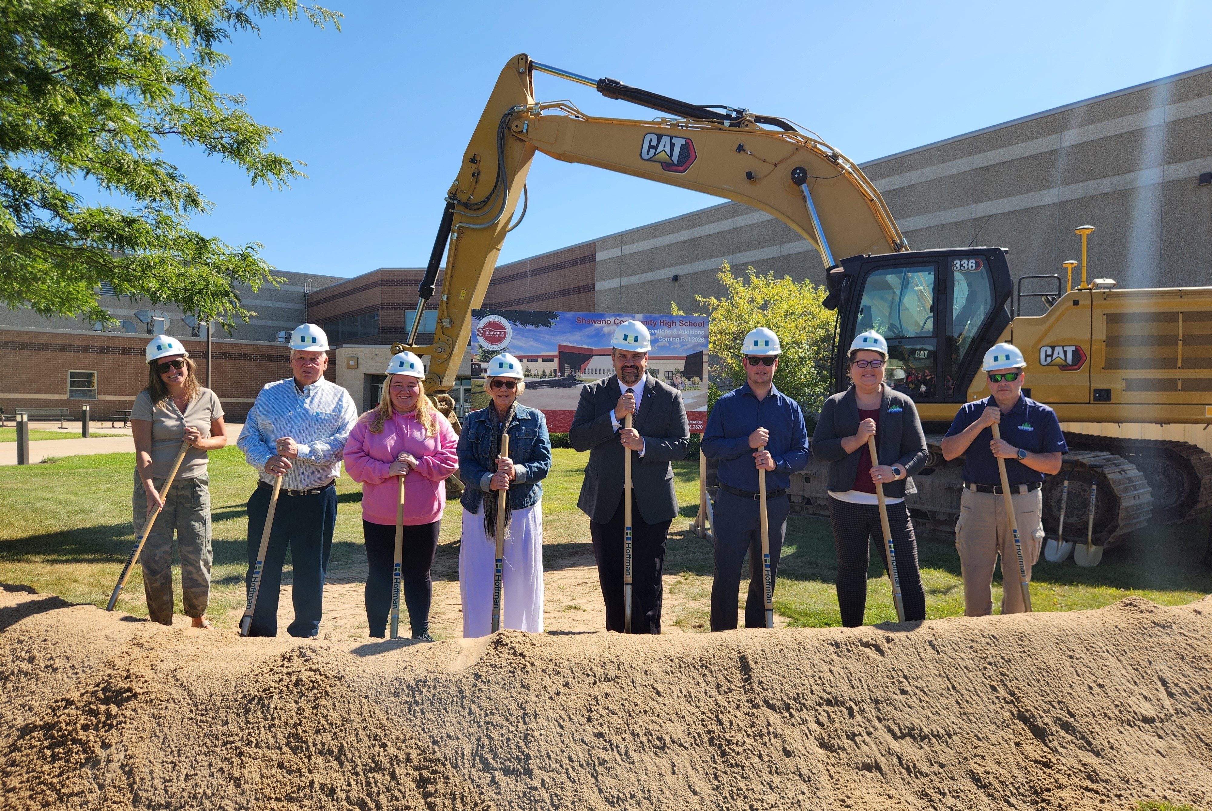 Community Members Pose with Superintendent During the Groundbreaking