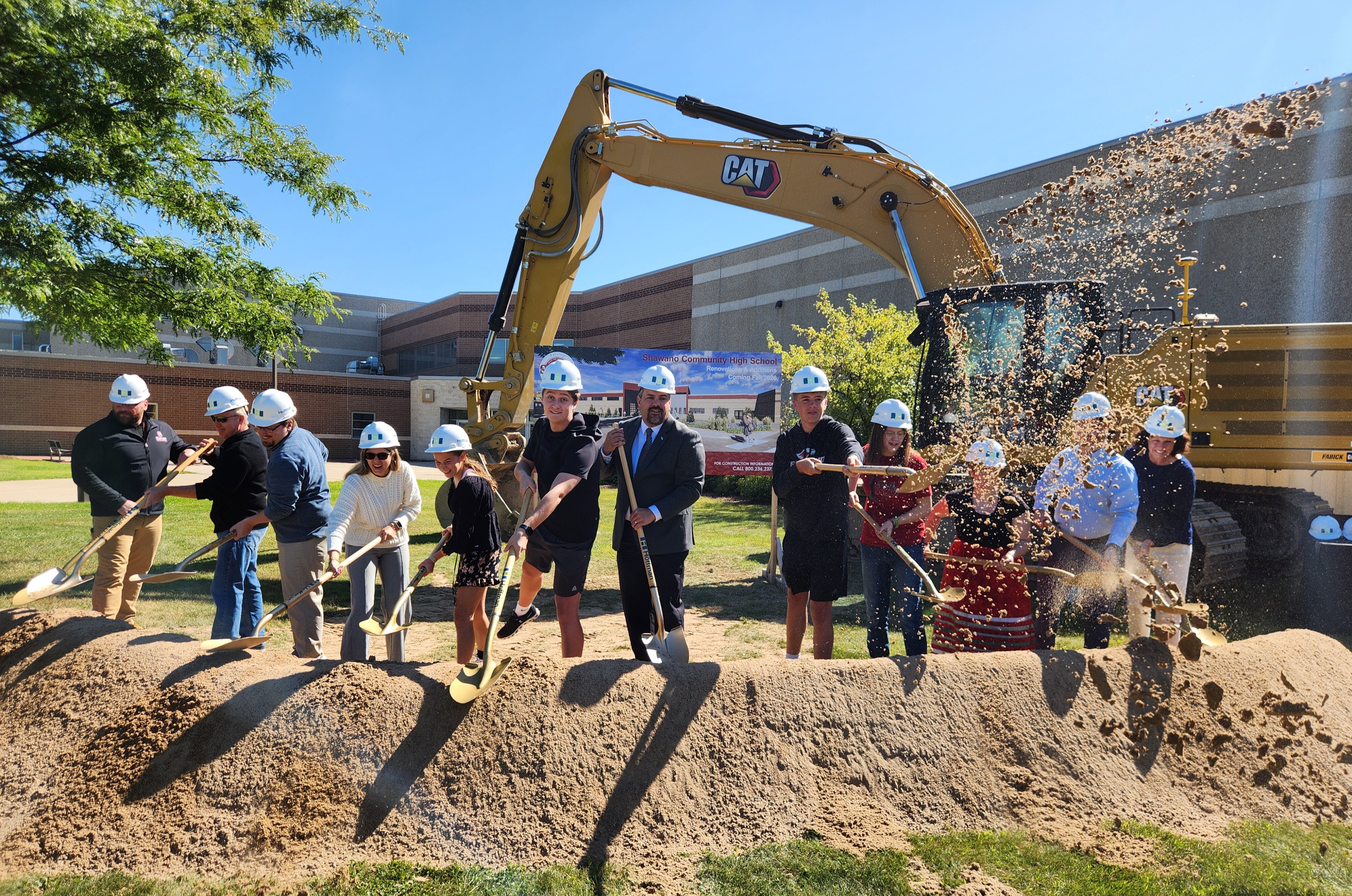 Students and Families Turn Dirt During the Groundbreaking